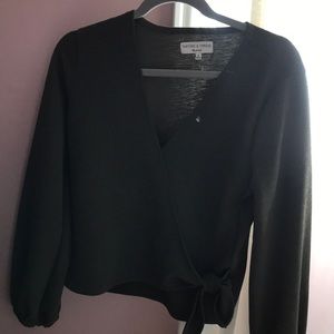 Green shirt with tie at bottom